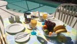 Breakfast by the pool - can't wait... - www.iwantavilla.com is the best in Orlando vacation Villa rentals