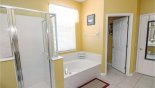 Master ensuite bathroom with walk-in shower, bath, his & her vanity basins and separate WC - www.iwantavilla.com is your first choice of Villa rentals in Orlando direct with owner