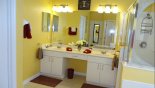 Master ensuite bathroom with walk-in shower, bath, his & her vanity basins and separate WC from Wasdale 1 Villa for rent in Orlando