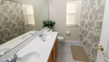 Villa rentals near Disney direct with owner, check out the Upstairs family bathroom #3 with bath & shower over, his & hers sinks and WC