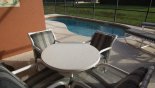 Covered lanai with patio table & 4 chairs from St Vincent Sound 2 Villa for rent in Orlando