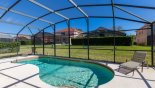 Sunny east facing pool with 2 sun loungers - www.iwantavilla.com is the best in Orlando vacation Villa rentals