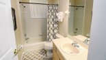 Ensuite bathroom #2 with bath & shower over, WC & single vanity - also serves as bathroom to ground floor - www.iwantavilla.com is the best in Orlando vacation Villa rentals