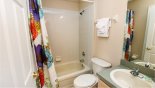 Jack & Jill bathroom #4 with bath & shower over, WC & single vanity sink from Calabay Parc rental Villa direct from owner