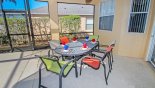 Covered lanai with patio table & 6 chairs from Calabay Parc rental Villa direct from owner