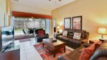 Family room with ample seating to watch a movie on the large LCD cable TV from Seville 1 Villa for rent in Orlando