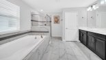 Villa rentals near Disney direct with owner, check out the Master ensuite #1 with large walk-in shower, bath, his & hers sinks & separate WC