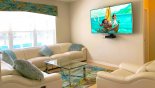 Villa rentals in Orlando, check out the Family room with  large wall mounted 4K TV & excellent streaming package
