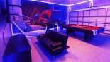 Superhero-themed game room with PS4, pool table, air hockey and basketball game from Windsor Hills Resort rental Villa direct from owner
