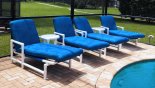 4 sun loungers plus addition 2 reclining chairs with footstools with this Orlando Villa for rent direct from owner