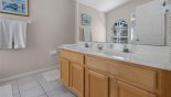 Master ensuite bathroom with bath, walk-in shower & his 'n' hers sinks & WC with this Orlando Villa for rent direct from owner
