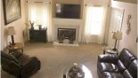 Orlando Villa for rent direct from owner, check out the Great room with fireplace & large wall mounted LED TV