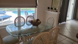 Orlando Villa for rent direct from owner, check out the Dining area with glass topped dining table & 6 comfortable chairs - views onto pool deck