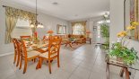 Villa rentals in Orlando, check out the Dining area and living room viewed from family room entrance