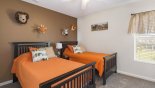 The Safari bedroom #3 with twin sized beds with this Orlando Villa for rent direct from owner