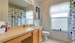 Family bathroom between bedroom 3 & 4 with bath & shower over from St Vincent Sound 1 Villa for rent in Orlando