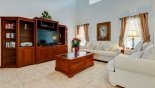 Entertainment in  family room with large LCD TV, PS2 & CD stereo with this Orlando Villa for rent direct from owner