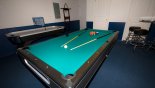Games room showing pool table & air hockey - www.iwantavilla.com is the best in Orlando vacation Villa rentals