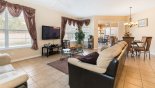Family room viewed towards dining area with this Orlando Villa for rent direct from owner